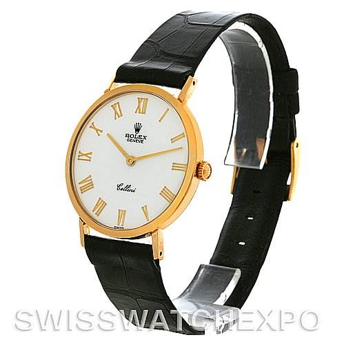 The image shows a Rolex Cellini 4112 Yellow Gold White Dial 4112 Yellow Gold White Dial watch at an angled side view, featuring a gold case, white dial, and black leather strap.