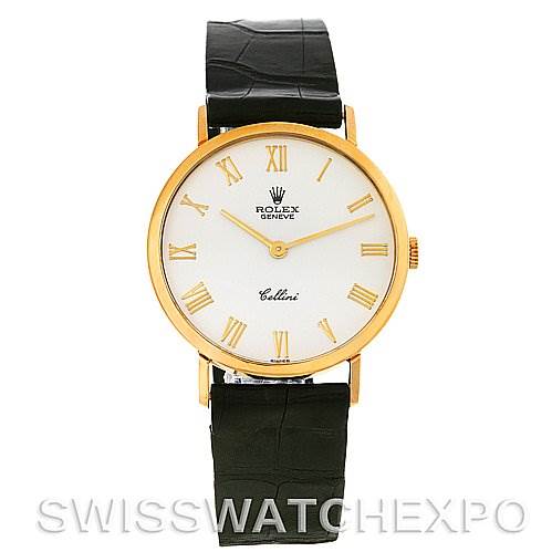 The image shows a frontal view of the Rolex Cellini 4112 Yellow Gold White Dial 4112 Yellow Gold White Dial watch featuring a gold case, white dial, Roman numerals, and black leather strap.