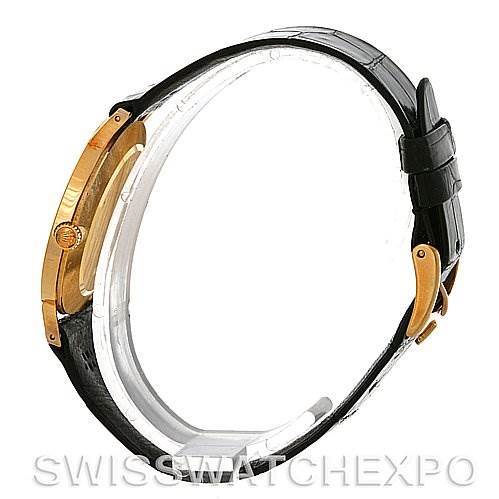 The image shows a side profile view of the Rolex Cellini 4112 Yellow Gold White Dial 4112 Yellow Gold White Dial watch, highlighting the gold case and black leather strap.