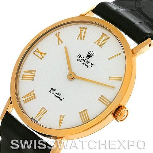 This image shows a close-up, angled view of the Rolex Cellini 4112 Yellow Gold White Dial 4112 Yellow Gold White Dial watch, displaying its dial, hands, and part of the leather strap.