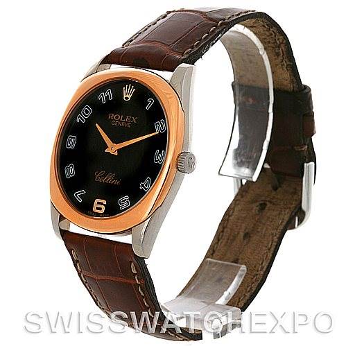 The image shows a Rolex Cellini 4233 Men
s White Gold Black Dial 4233 Men
s White Gold Black Dial watch at an angled side view, highlighting its black dial, rose gold bezel, and brown leather strap.