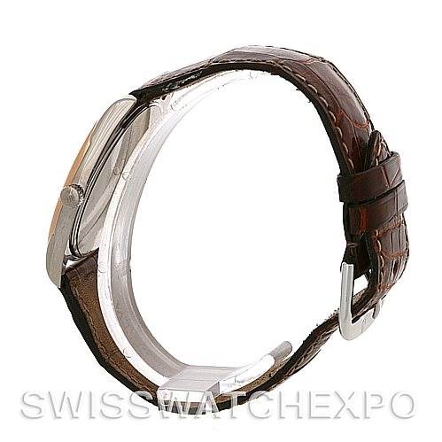 The image shows a side view of a Rolex Cellini 4233 Men
s White Gold Black Dial 4233 Men
s White Gold Black Dial watch, highlighting its case, crown, and brown leather strap.