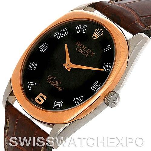 The image shows a Rolex Cellini 4233 Men
s White Gold Black Dial 4233 Men
s White Gold Black Dial watch angled to display its face, bezel, crown, and part of the leather strap.
