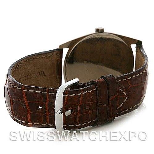 This image shows the Rolex Cellini 4233 Men
s White Gold Black Dial 4233 Men
s White Gold Black Dial watch from the rear, highlighting its brown leather strap and clasp.