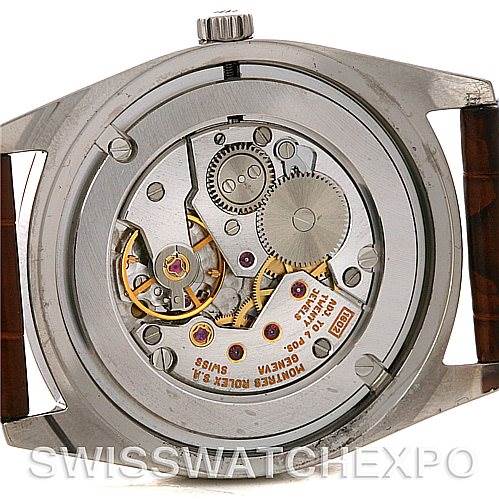 This image shows the back view of a Rolex Cellini 4233 Men
s White Gold Black Dial 4233 Men
s White Gold Black Dial watch, revealing its intricate mechanical movement.