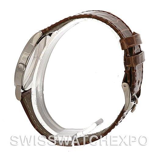 This image shows a side view of a Rolex Cellini 5115 Men's White Gold Silver Dial 5115 Men's White Gold Silver Dial watch, highlighting its case, crown, and brown leather strap.