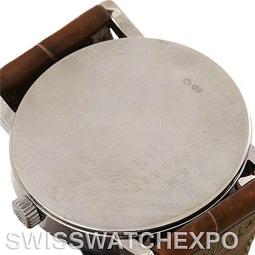 This image shows the back of the Rolex Cellini 5115 Men's White Gold Silver Dial 5115 Men's White Gold Silver Dial watch, focusing on the case and attached brown leather straps.