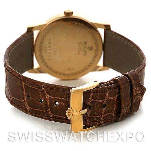 This image shows the back view of a Rolex Cellini 5116 Men's Yellow Gold Grey Dial 5116 Men's Yellow Gold Grey Dial watch, focusing on the leather strap and clasp.