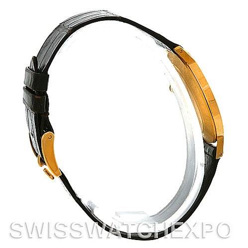 The image shows a Rolex Cellini 4112 Yellow Gold White Dial 4112 Yellow Gold White Dial watch from a side view, focusing on the gold case and black leather strap.