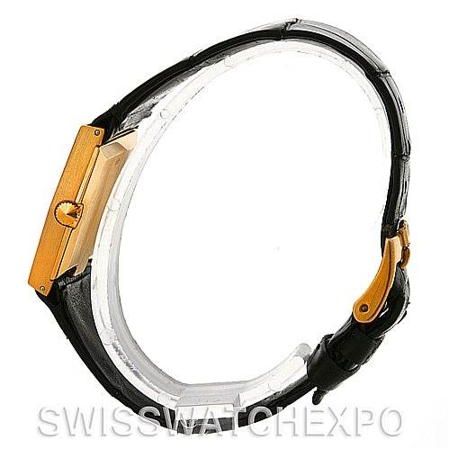 The image shows a side view of a Rolex Cellini 4017 Men
s Yellow Gold Champagne Dial 4017 Men
s Yellow Gold Champagne Dial watch, highlighting its gold case, crown, and black leather strap with a gold buckle.