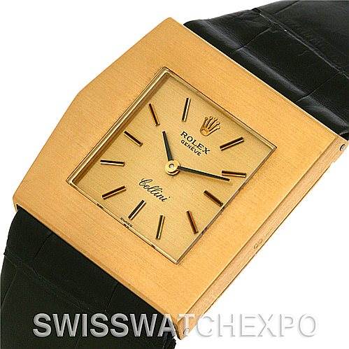 The image shows a close-up, front view of a Rolex Cellini 4017 Men
s Yellow Gold Champagne Dial 4017 Men
s Yellow Gold Champagne Dial watch with a gold square dial and a black leather strap.