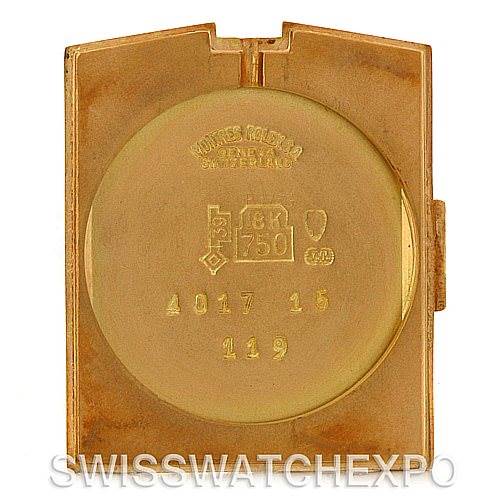 The image shows the back case cover of a Rolex Cellini 4017 Men
s Yellow Gold Champagne Dial 4017 Men
s Yellow Gold Champagne Dial watch, highlighting its internal engravings and gold markings.