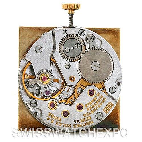 The image shows the internal movement of a Rolex Cellini 4017 Men
s Yellow Gold Champagne Dial 4017 Men
s Yellow Gold Champagne Dial watch from a top-down angle.