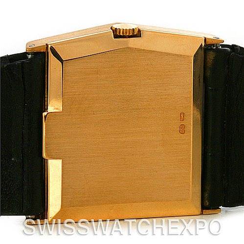 This image shows the back case and crown of a Rolex Cellini 4017 Men
s Yellow Gold Champagne Dial 4017 Men
s Yellow Gold Champagne Dial watch from a rear angle.