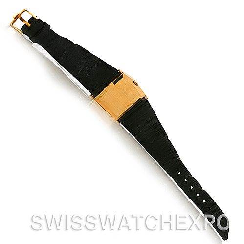 This image shows the Rolex Cellini 4017 Men
s Yellow Gold Champagne Dial 4017 Men
s Yellow Gold Champagne Dial watch laid flat, highlighting the black leather strap and gold-plated rectangular case from a top-down view.