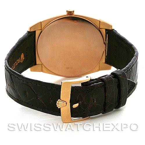 The image shows the back of the Rolex Cellini 5330/5 Men's Rose Gold White Dial 5330/5 Men's Rose Gold White Dial watch, focusing on its leather strap and gold buckle.