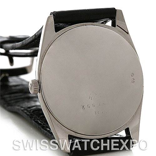 This image shows the case back and leather strap of a Rolex Cellini 4233 Men's White Gold White Dial 4233 Men's White Gold White Dial watch from a rear angle.