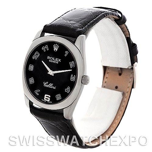 The image shows a Rolex Cellini 4233 Men's White Gold Black Dial 4233 Men's White Gold Black Dial watch at an angle that highlights its face, crown, and black leather strap.