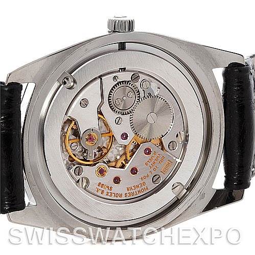 This image shows the inner mechanical movement and components of a Rolex Cellini 4233 Men's White Gold Black Dial 4233 Men's White Gold Black Dial watch from a rear angle.