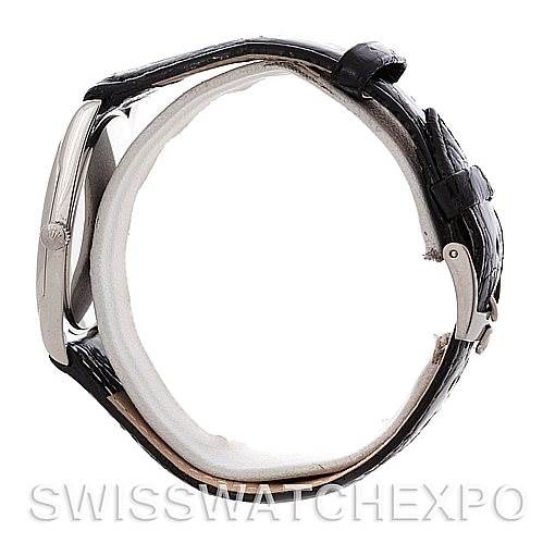 This image shows a side view of a Rolex Cellini 4233 Men's White Gold Black Dial 4233 Men's White Gold Black Dial watch, highlighting the case, crown, and leather strap with buckle.