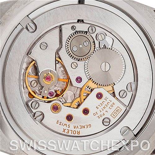 This image shows the intricate internal mechanism and gears of the Rolex Cellini 4233 Men
s White Gold White Dial 4233 Men
s White Gold White Dial model watch from a top-down angle.