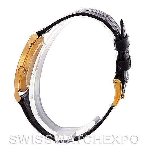 The image shows a side profile of a Rolex Cellini 5112 Men's Yellow Gold Beige Dial 5112 Men's Yellow Gold Beige Dial watch, highlighting its gold case, crown, and black leather strap with a buckle.