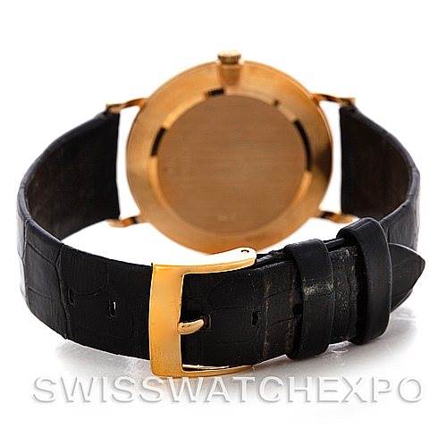 This image shows the back view of the Rolex Cellini 5112 Men's Yellow Gold Beige Dial 5112 Men's Yellow Gold Beige Dial watch, highlighting its leather strap and gold-tone buckle.