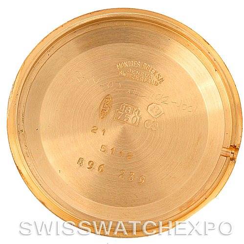 This image shows the inner case back of a Rolex Cellini 5112 Men's Yellow Gold Beige Dial 5112 Men's Yellow Gold Beige Dial watch, featuring engravings and markings.