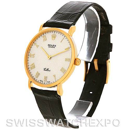 The image shows a Rolex Cellini 5112 Men's Yellow Gold Beige Dial 5112 Men's Yellow Gold Beige Dial watch at an angled side view, displaying its face, strap, and part of the clasp.