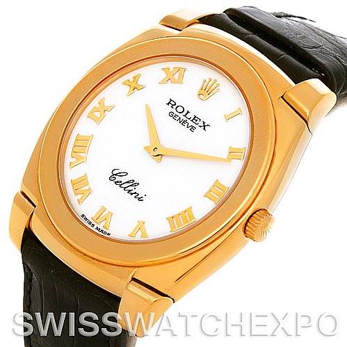The image shows a top-angle view of a Rolex Cellini 5330 Men
s Yellow Gold White Dial 5330 Men
s Yellow Gold White Dial watch, featuring its gold case, Roman numeral dial, and black leather strap.