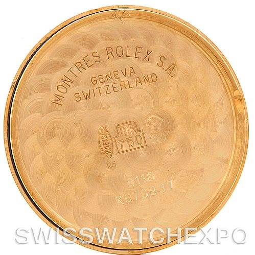 This image shows the inside of the back case cover of a Rolex Cellini 5116 Men
s Yellow Gold Grey Dial 5116 Men
s Yellow Gold Grey Dial watch, highlighting the brand
s engraving and hallmark.