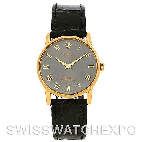 This Rolex Cellini 5116 Men
s Yellow Gold Grey Dial 5116 Men
s Yellow Gold Grey Dial watch is shown from a front angle, displaying its black leather strap and gold case with a grey dial and Roman numerals.