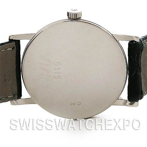 This image shows the back case and crown of a Rolex Cellini 5115 Men's White Gold Silver Dial 5115 Men's White Gold Silver Dial watch.