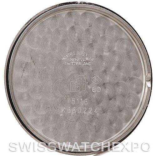 This image shows the case back of a Rolex Cellini 5116 Men's White Gold Grey Dial 5116 Men's White Gold Grey Dial model watch from an overhead angle, featuring various engravings and markings.