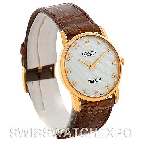 This is a Rolex Cellini 5116 Men's Yellow Gold Mother of Pearl Dial 5116 Men's Yellow Gold Mother of Pearl Dial watch shown at an angle highlighting its gold case, white dial, brown leather strap, and gold hour markers.