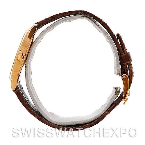 This image shows a side view of the Rolex Cellini 5116 Men's Yellow Gold Mother of Pearl Dial 5116 Men's Yellow Gold Mother of Pearl Dial watch, highlighting its gold case and brown leather strap.