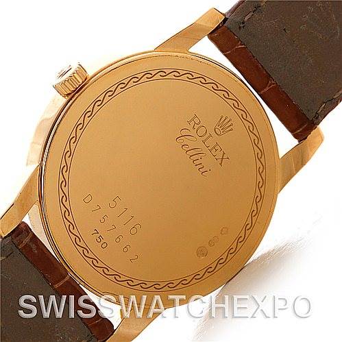 The image shows the back case of a Rolex Cellini 5116 Men's Yellow Gold Mother of Pearl Dial 5116 Men's Yellow Gold Mother of Pearl Dial watch, highlighting the engraved details and leather straps.