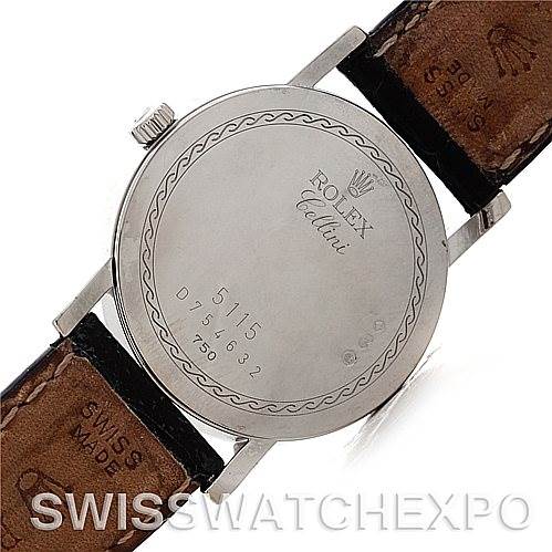 The image shows the back of a Rolex Cellini 5115 Men's White Gold Grey Dial 5115 Men's White Gold Grey Dial watch, featuring a leather strap and engraved details on the case back.