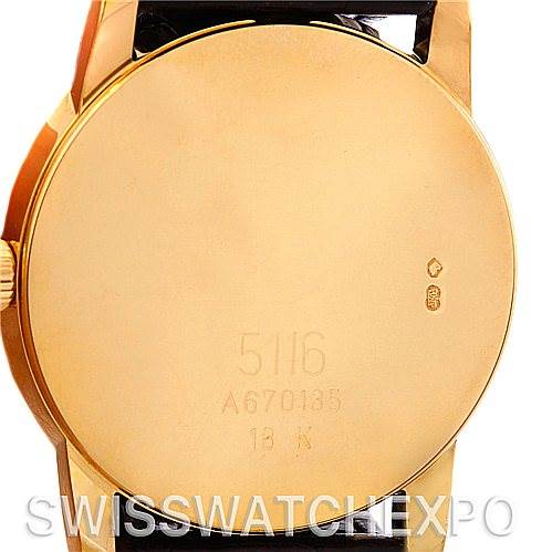 This image shows the case back of a Rolex Cellini 5116 Men's Yellow Gold Silver Dial 5116 Men's Yellow Gold Silver Dial watch, highlighting its gold material and engraved markings.