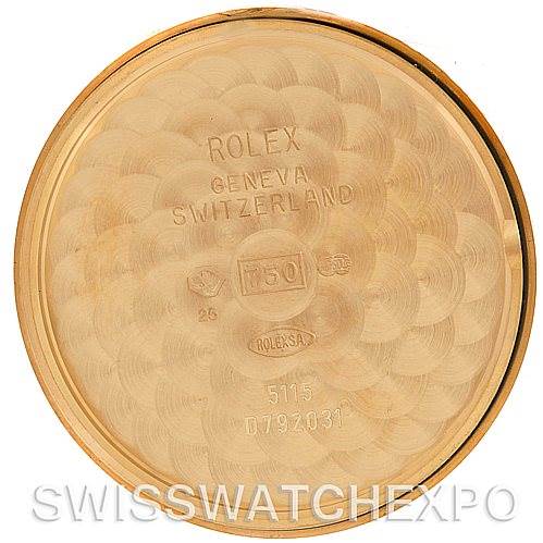 The image shows the interior of the case back of a Rolex Cellini 5115 Men's Yellow Gold Black Dial 5115 Men's Yellow Gold Black Dial watch, featuring model and brand engravings.