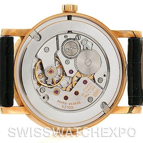 This image shows the back view of the Rolex Cellini 5115 Men's Yellow Gold Black Dial 5115 Men's Yellow Gold Black Dial model, displaying the intricate mechanical movement and parts.