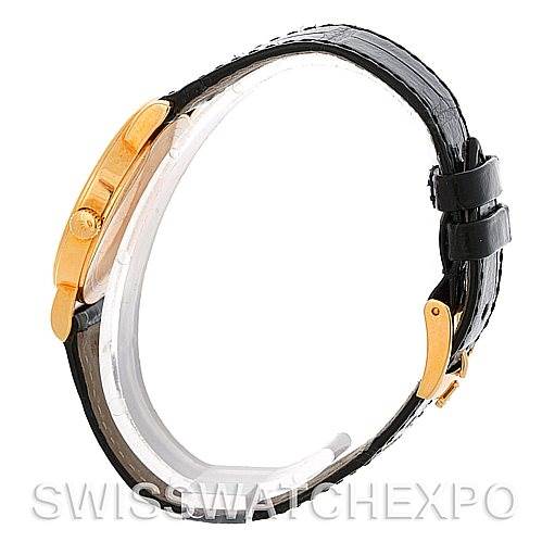 This image shows a side view of a Rolex Cellini 5115 Men's Yellow Gold Black Dial 5115 Men's Yellow Gold Black Dial watch, highlighting the crown and black leather strap with a gold clasp.