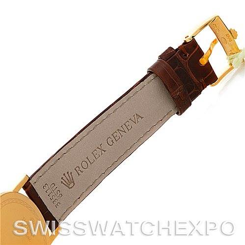 The image shows the strap and buckle of a Rolex Cellini 5115 Men's Yellow Gold Silver Dial 5115 Men's Yellow Gold Silver Dial watch, highlighting the leather strap and gold buckle.