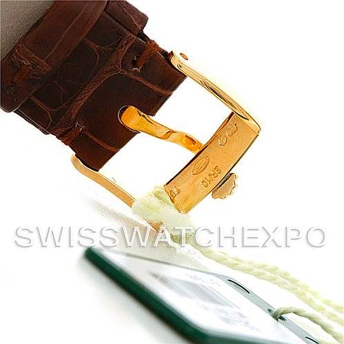 The image shows the clasp and strap of a Rolex Cellini 5115 Men's Yellow Gold Silver Dial 5115 Men's Yellow Gold Silver Dial watch at an angle, featuring a brown leather band and a gold buckle.