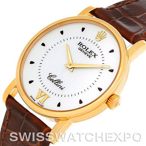 The image shows a close-up angled view of the Rolex Cellini 5115 Men's Yellow Gold Silver Dial 5115 Men's Yellow Gold Silver Dial watch, featuring its face, crown, and part of its leather strap.