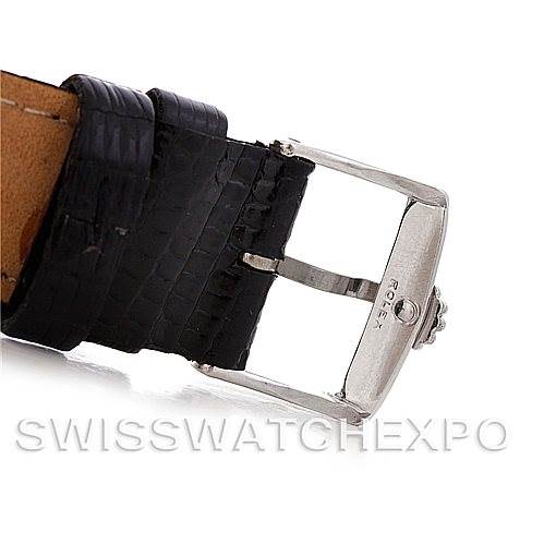 This is a close-up of the buckle and part of the leather strap of a Rolex Cellini 4014 Men's White Gold Black Dial 4014 Men's White Gold Black Dial watch.