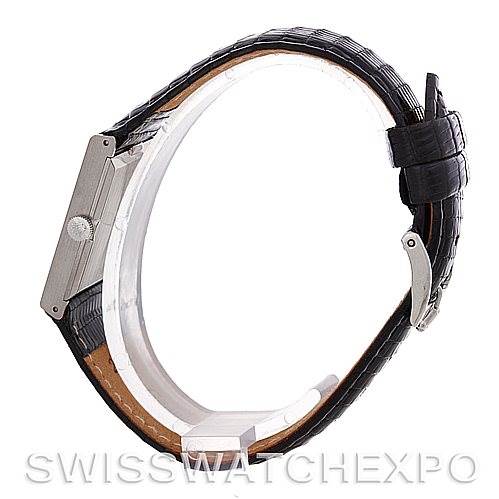 This side view of the Rolex Cellini 4014 Men's White Gold Black Dial 4014 Men's White Gold Black Dial model showcases the watch case, crown, and leather strap.