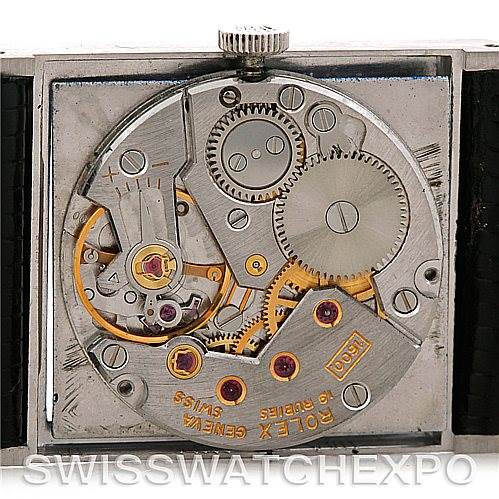This image shows the internal mechanical movement of a Rolex Cellini 4014 Men's White Gold Black Dial 4014 Men's White Gold Black Dial watch, viewed from the back with the case opened.