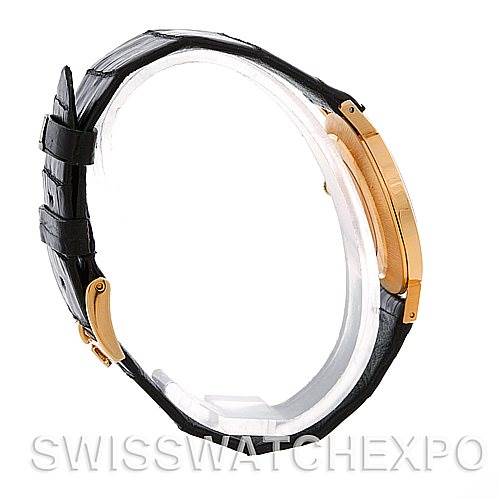 The image shows a side view of the Rolex Cellini 4112 Men's Yellow Gold Silver Dial 4112 Men's Yellow Gold Silver Dial watch, highlighting its case, crown, and leather strap with a buckle.