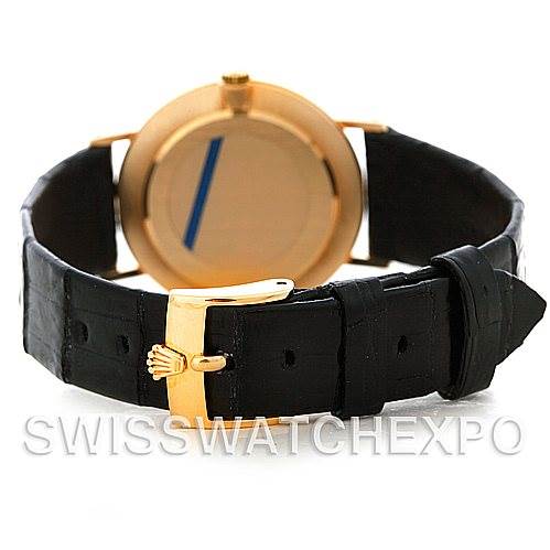 The image shows the back case and strap of a Rolex Cellini 4112 Men's Yellow Gold Silver Dial 4112 Men's Yellow Gold Silver Dial watch, highlighting the black leather strap and gold buckle.